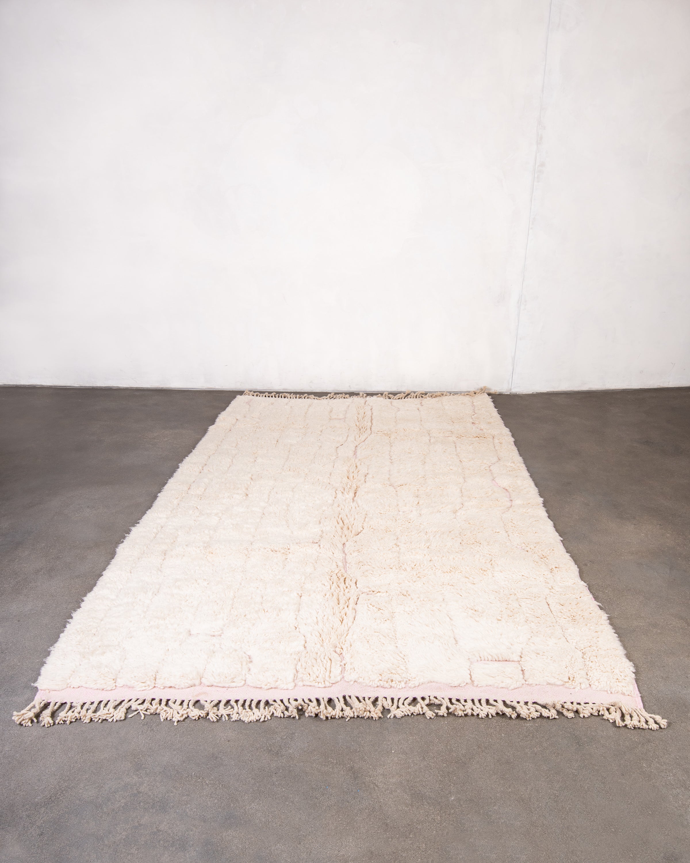 Modern, designer, handcrafted Berber rug from Morocco. Beniourain carpet with beautiful colors and patterns and fluffy wool texture.
